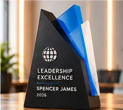 Faceted tower award in black and blue reading LEADERSHIP EXCELLENCE