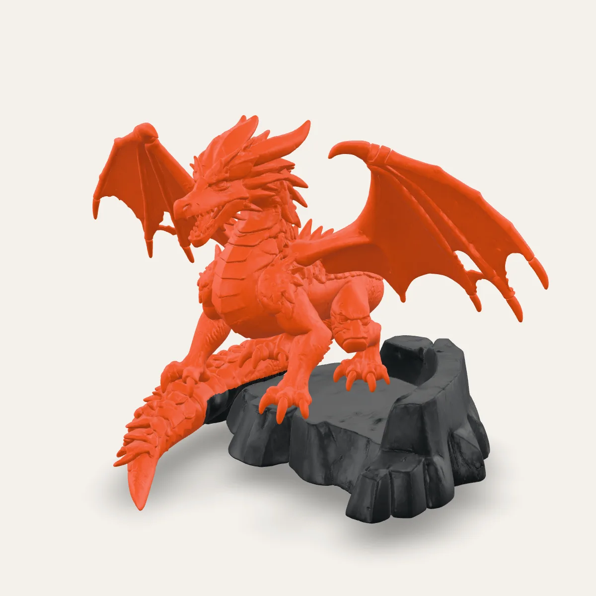 Dragon statue 3D printed in Signal Orange on a Graphite rock base